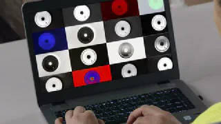 The Aurora Focus smart camera inspecting parts on a bench